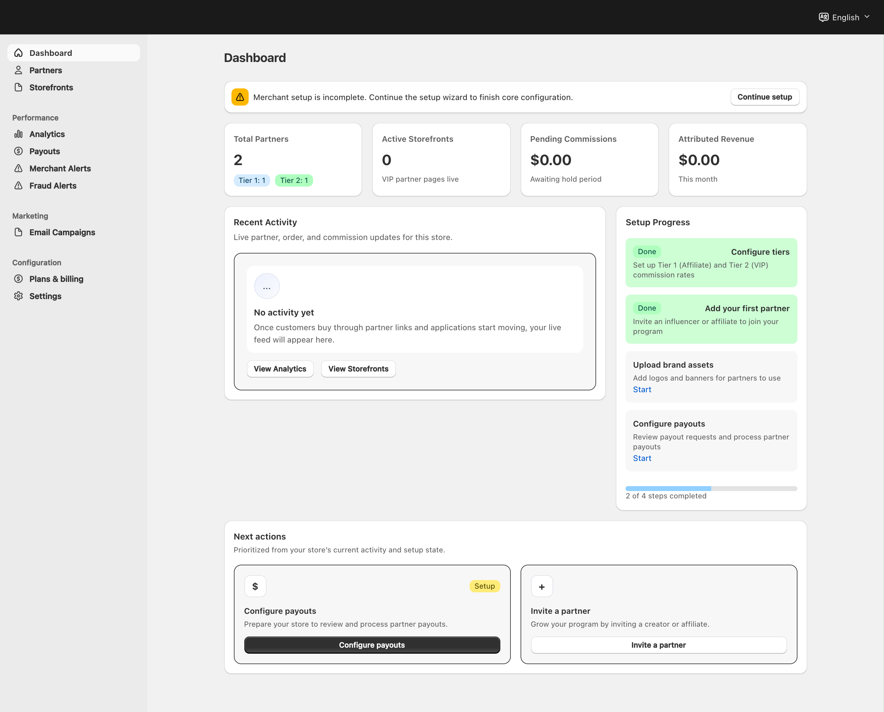 Merchant dashboard with navigation, header language menu, metrics and Continue setup