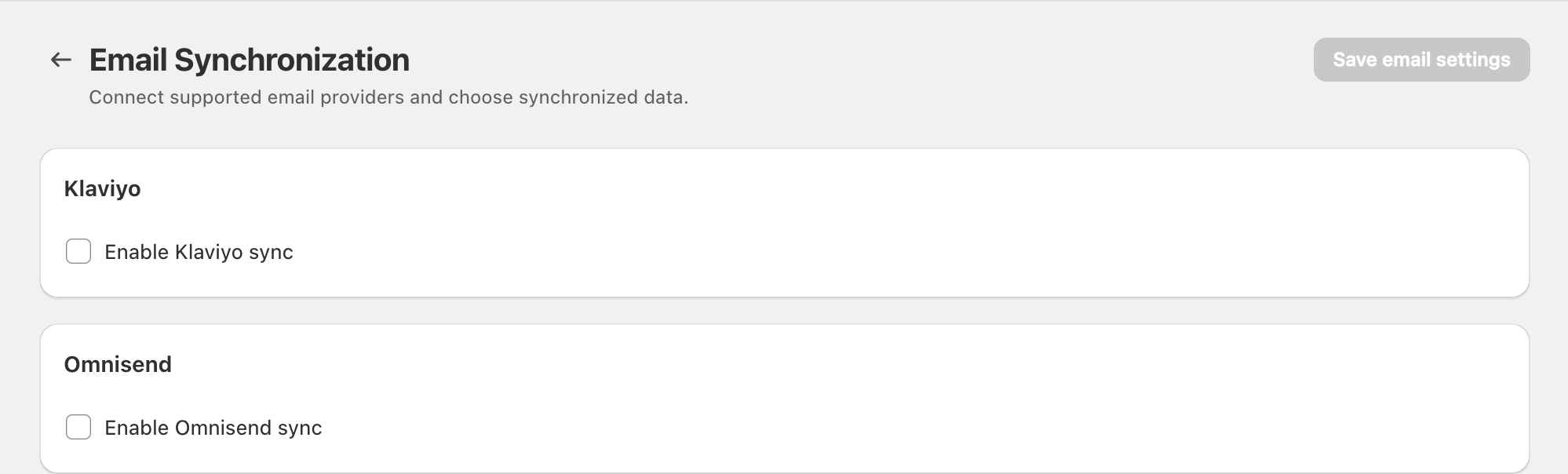 Email Synchronization showing unchecked Klaviyo and Omnisend enable controls